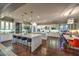 Spacious, modern kitchen with stainless steel appliances, dual islands, and an adjacent dining area at 62 Grand Masters Dr, Las Vegas, NV 89141