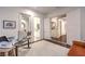 Bright office and bathroom entry featuring a modern desk and decor at 62 Grand Masters Dr, Las Vegas, NV 89141