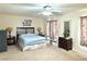 Bedroom featuring a ceiling fan and ample natural light at 66 John Stuart Mill St, Henderson, NV 89002