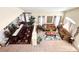 Top-down view of the dining and living room area with comfortable seating and decor at 66 John Stuart Mill St, Henderson, NV 89002