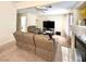 A comfortable living room with a fireplace and neutral colored walls at 66 John Stuart Mill St, Henderson, NV 89002