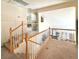 Carpeted staircase with a white railing leading to the upper level at 66 John Stuart Mill St, Henderson, NV 89002