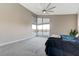 Spacious bedroom with large windows offering views and filled with natural light at 6832 Apogee Ridge Ct, Las Vegas, NV 89135