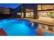 Backyard with a pool, spa, and fire feature for outdoor living at 6832 Apogee Ridge Ct, Las Vegas, NV 89135
