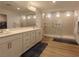 Modern bathroom featuring a large shower, dual sinks, and spacious countertops at 6837 Crimson Lily St, Las Vegas, NV 89139