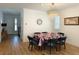 Dining room featuring a chandelier and modern furnishings, open to the living space at 6837 Crimson Lily St, Las Vegas, NV 89139
