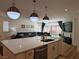 Spacious open floor plan connecting the kitchen, dining and living spaces, perfect for entertaining at 6837 Crimson Lily St, Las Vegas, NV 89139