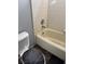 Bathroom with old fixtures showing wear and tear and dirty flooring at 693 W Pacific Ave, Henderson, NV 89002