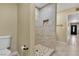 Walk-in shower features custom tile and niche at 7604 Charles Conrad Cir, Las Vegas, NV 89145