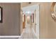 Hallway with tile flooring and neutral paint at 7604 Charles Conrad Cir, Las Vegas, NV 89145