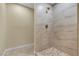 Stylish shower featuring modern tile, hardware, and a sleek design, creating a luxurious bathing experience at 7604 Charles Conrad Cir, Las Vegas, NV 89145
