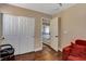 This neutral bedroom features wood floors and a closet at 8022 Severn Valley St, Las Vegas, NV 89139