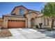 Charming two-story home featuring a two-car garage, desert landscaping, and an inviting arched entryway at 8022 Severn Valley St, Las Vegas, NV 89139