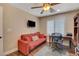 Dedicated office space with comfortable seating, hardwood floors, and bright window that creates an ideal workspace at 8022 Severn Valley St, Las Vegas, NV 89139