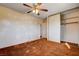 Bedroom featuring a closet with sliding doors and a ceiling fan at 804 S Mallard St, Las Vegas, NV 89107