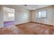 Bedroom with a window providing ample natural light and a ceiling fan for comfort at 804 S Mallard St, Las Vegas, NV 89107