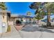 Landscaped driveway of single story house leading to the front entrance, featuring cacti and desert plants at 804 S Mallard St, Las Vegas, NV 89107