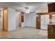 Bright kitchen features an open layout with tile flooring and white appliances, connected to the living area at 804 S Mallard St, Las Vegas, NV 89107