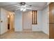Bright living room featuring tile floors, neutral walls, and traditional design elements, creating a welcoming space at 804 S Mallard St, Las Vegas, NV 89107