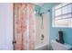 Stylish bathroom with a shower/tub combo and a decorative shower curtain and cowboy boot at 8321 Gorsky Ave, Las Vegas, NV 89131