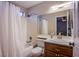 Bathroom features a tub/shower combination and a large vanity mirror at 8321 Gorsky Ave, Las Vegas, NV 89131