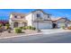 Charming two-story home with a three car garage, well maintained landscaping, and a welcoming entrance at 8321 Gorsky Ave, Las Vegas, NV 89131