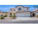 Inviting two-story home with a three car garage and well-maintained landscaping at 8321 Gorsky Ave, Las Vegas, NV 89131