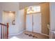 Bright foyer featuring double doors, tile flooring, and an alcove perfect for displaying decorations at 8321 Gorsky Ave, Las Vegas, NV 89131