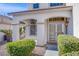Welcoming front porch with manicured bushes, stylish double door, and charming overhead light at 8321 Gorsky Ave, Las Vegas, NV 89131