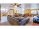 Spacious living area with an open floor plan connecting to the kitchen and dining spaces at 8321 Gorsky Ave, Las Vegas, NV 89131