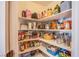 Organized pantry shelves stocked with various food items and kitchen essentials at 8321 Gorsky Ave, Las Vegas, NV 89131