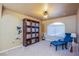 Cozy sitting room with natural light, a bookcase, and comfortable furnishings at 8321 Gorsky Ave, Las Vegas, NV 89131