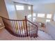 Grand curved staircase with a view of the living area and high ceilings at 8321 Gorsky Ave, Las Vegas, NV 89131