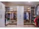 Large walk-in closet with custom shelving, ample storage, and an organized clothing display at 8321 Gorsky Ave, Las Vegas, NV 89131