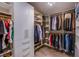 Custom walk-in closet features shelving, hanging racks, and drawers at 8321 Gorsky Ave, Las Vegas, NV 89131