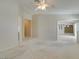 Inviting bedroom featuring plush carpets and great lighting at 8404 Dripping Rock Ct, Las Vegas, NV 89131