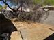 Another view of the backyard showcasing its size, privacy fence, and outdoor potential at 8616 Hidden Pines Ave, Las Vegas, NV 89143