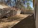 View of the backyard featuring a block wall fence, potential for landscaping and outdoor living at 8616 Hidden Pines Ave, Las Vegas, NV 89143