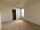Bedroom with closet and window providing natural light at 8616 Hidden Pines Ave, Las Vegas, NV 89143