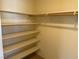 Spacious closet with shelving and rod, providing organized storage solutions at 8616 Hidden Pines Ave, Las Vegas, NV 89143