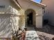 Inviting front entrance with a covered porch and well-manicured landscaping at 8616 Hidden Pines Ave, Las Vegas, NV 89143