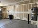 Spacious garage featuring a water heater and offering ample storage at 8616 Hidden Pines Ave, Las Vegas, NV 89143