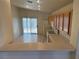 Eat-in kitchen featuring a breakfast bar, tile floors, and access to the backyard at 8616 Hidden Pines Ave, Las Vegas, NV 89143