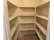 A well-organized pantry with multiple shelves and ample storage space for groceries and kitchen supplies at 8616 Hidden Pines Ave, Las Vegas, NV 89143