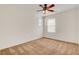 Neutral bedroom featuring carpet flooring, a ceiling fan and two windows allowing for great sunlight at 8626 Anderson Dale Ave, Las Vegas, NV 89178