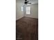 Large bedroom with neutral walls, carpet, ceiling fan, and natural light from windows at 8626 Anderson Dale Ave, Las Vegas, NV 89178