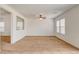 Spacious living room featuring neutral carpet and an open view at 8626 Anderson Dale Ave, Las Vegas, NV 89178