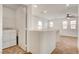 Spacious loft area featuring a laundry closet and ample natural light at 8626 Anderson Dale Ave, Las Vegas, NV 89178