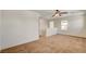 Open loft space featuring neutral carpeting and natural light from the windows at 8626 Anderson Dale Ave, Las Vegas, NV 89178