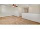 Spacious loft area with neutral carpeting, perfect for a second living space or play area at 8626 Anderson Dale Ave, Las Vegas, NV 89178